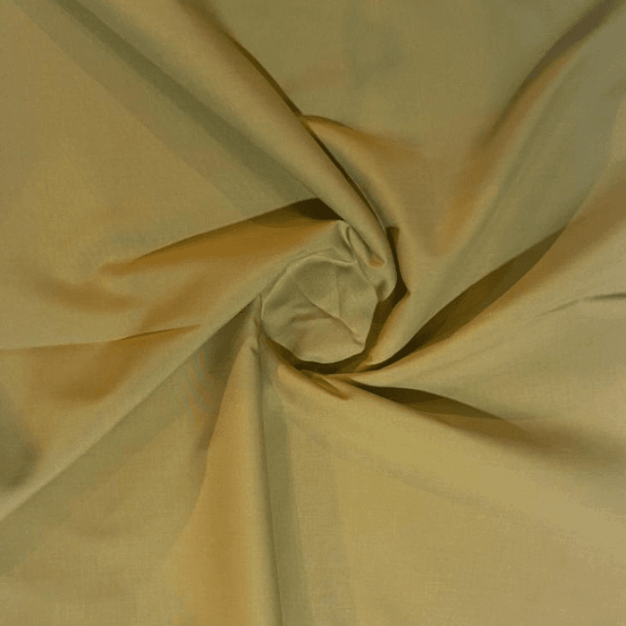 Muted dusty olive gold Prime Minister men's suiting fabric in a soft swirl