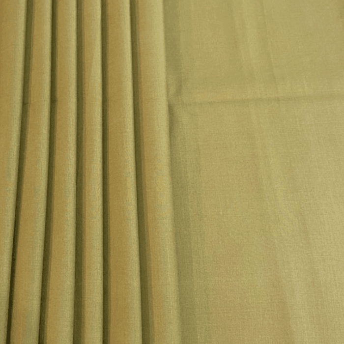 Sage green men's suiting fabric with soft pleated drape