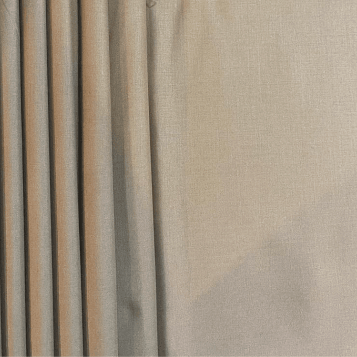 Warm grey taupe men's suiting fabric with soft pleated drape