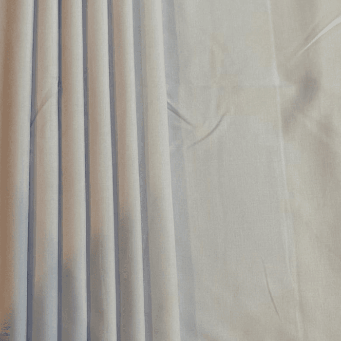 Pale ice blue men's suiting fabric with soft pleated drape